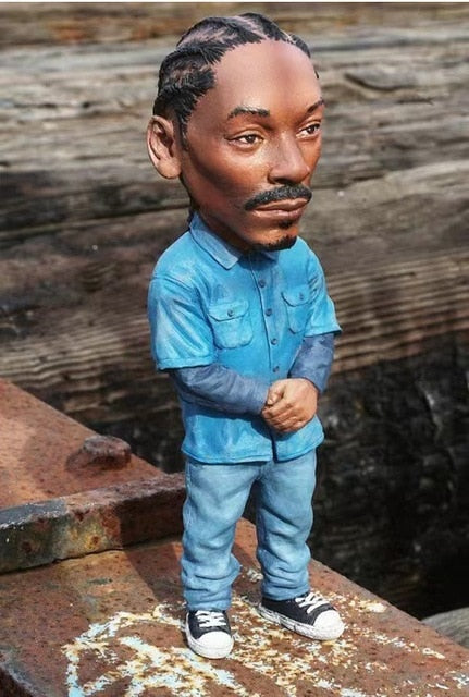 The Resin Art Mini Doll is a great addition to any home, office, car, or room decoration. Crafted from resin art and flavored with a hip hop rapper look, this unique kawaii accessory makes a bold, modern statement and is sure to draw attention. A perfect choice for those wanting to infuse artful styling into their decor, this mini doll is sure to spark conversation.