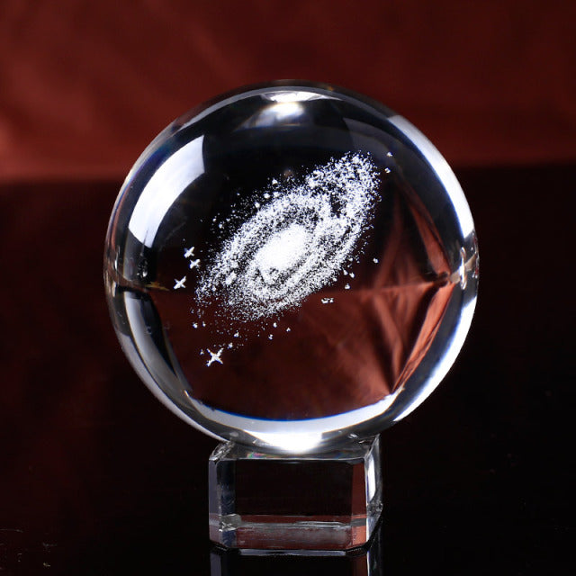 This 3D Galaxy Miniature Crystal Ball is just what you need to add a touch of elegance and class to your home décor. It is made of high-quality K9 crystal that makes it durable and long lasting. The beautiful transparency of the crystal ball gives it a magnificent look that is sure to grab everyone's attention.