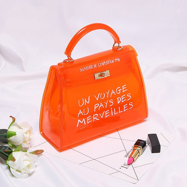 Clear Transparent PVC Shoulder Bags Un Voyage au Pays des Merveilles Emporium Discounts come in 5 different colours Brown, red, green, blue, orange