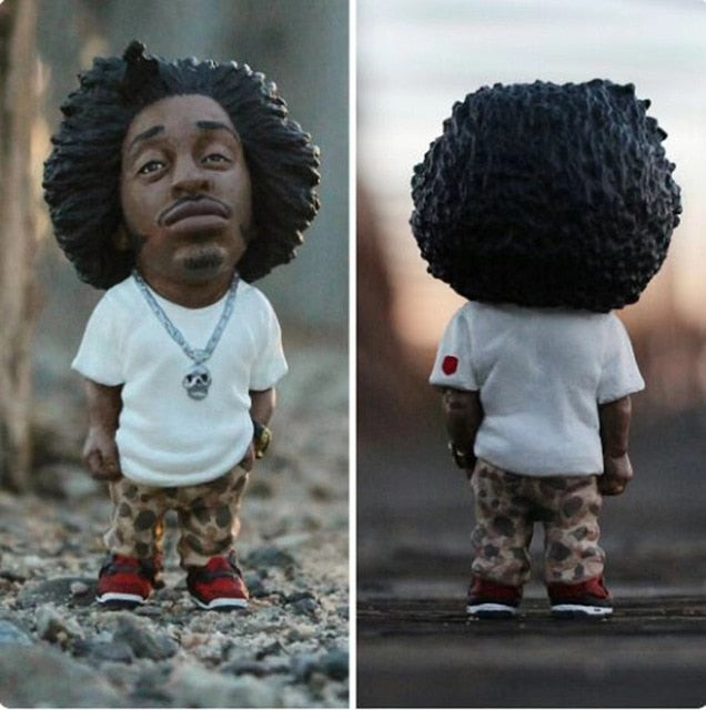 The Resin Art Mini Doll is a great addition to any home, office, car, or room decoration. Crafted from resin art and flavored with a hip hop rapper look, this unique kawaii accessory makes a bold, modern statement and is sure to draw attention. A perfect choice for those wanting to infuse artful styling into their decor, this mini doll is sure to spark conversation.