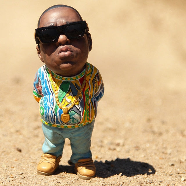 The Resin Art Mini Doll is a great addition to any home, office, car, or room decoration. Crafted from resin art and flavored with a hip hop rapper look, this unique kawaii accessory makes a bold, modern statement and is sure to draw attention. A perfect choice for those wanting to infuse artful styling into their decor, this mini doll is sure to spark conversation.