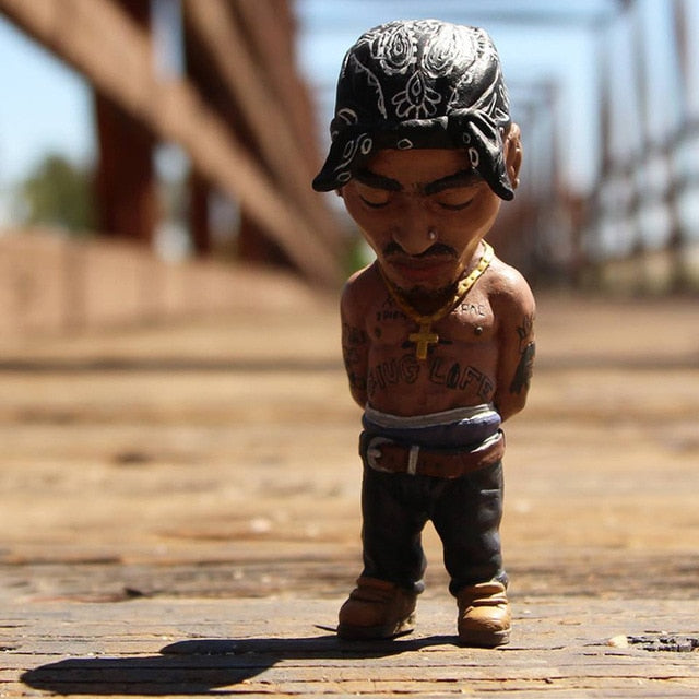 The Resin Art Mini Doll is a great addition to any home, office, car, or room decoration. Crafted from resin art and flavored with a hip hop rapper look, this unique kawaii accessory makes a bold, modern statement and is sure to draw attention. A perfect choice for those wanting to infuse artful styling into their decor, this mini doll is sure to spark conversation.