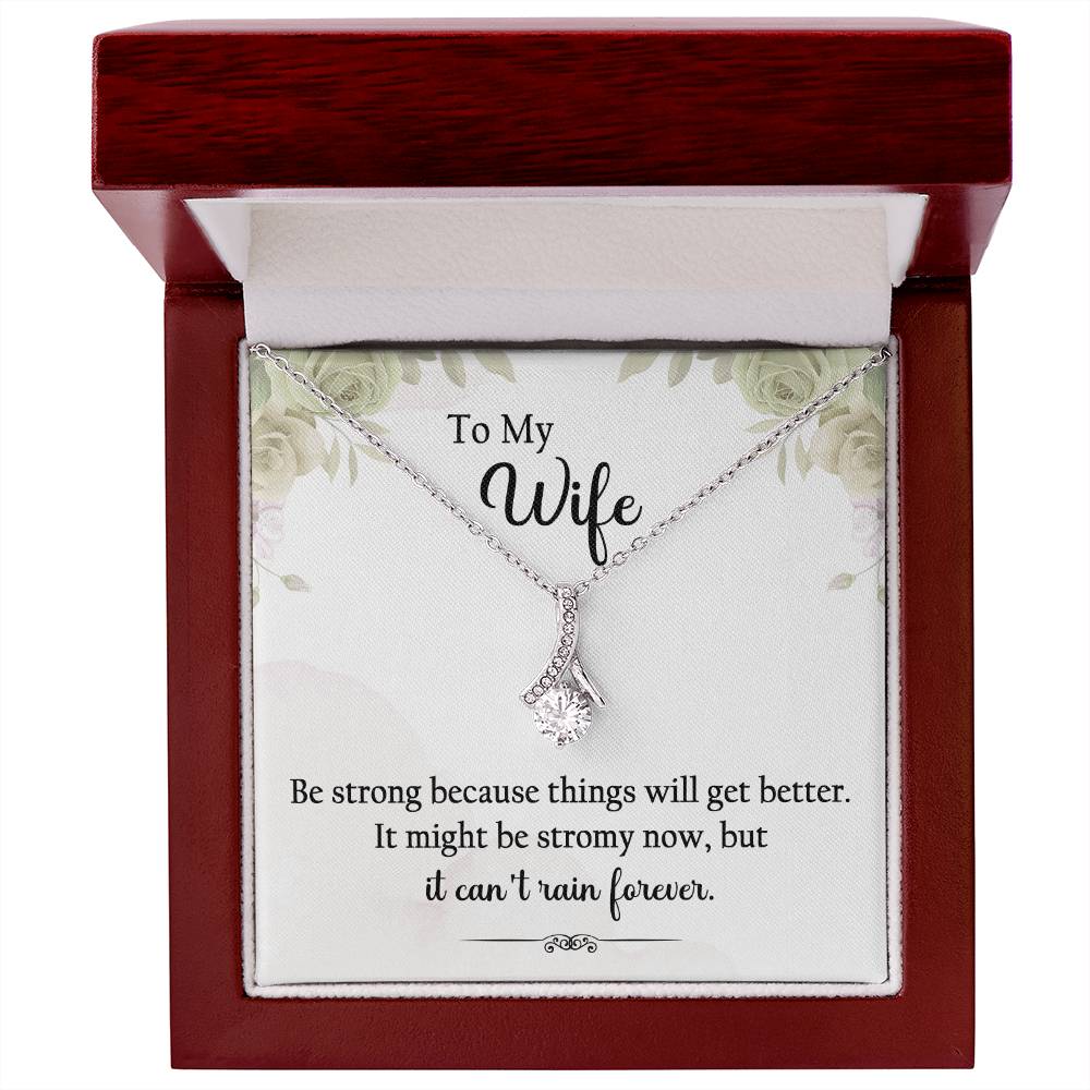 "To My Wife, Be strong because things will get better. It might be stormy now, but it can't rain forever." Alluring Beauty necklace, 14k white gold finish or 18k yellow gold finish over stainless steel. Shop now at Emporium Discounts A luxurious, yet affordable way to show your style. Enjoy the elegant craftsmanship and lasting quality of this beautiful necklace.
