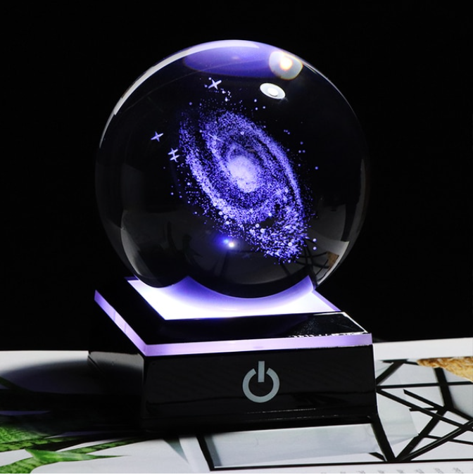 This 3D Galaxy Miniature Crystal Ball is just what you need to add a touch of elegance and class to your home décor. It is made of high-quality K9 crystal that makes it durable and long lasting. The beautiful transparency of the crystal ball gives it a magnificent look that is sure to grab everyone's attention.