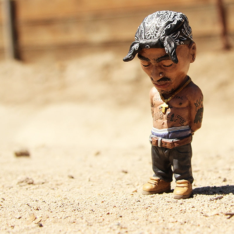 The Resin Art Mini Doll is a great addition to any home, office, car, or room decoration. Crafted from resin art and flavored with a hip hop rapper look, this unique kawaii accessory makes a bold, modern statement and is sure to draw attention. A perfect choice for those wanting to infuse artful styling into their decor, this mini doll is sure to spark conversation.