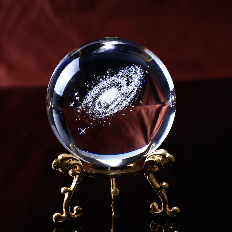 This 3D Galaxy Miniature Crystal Ball is just what you need to add a touch of elegance and class to your home décor. It is made of high-quality K9 crystal that makes it durable and long lasting. The beautiful transparency of the crystal ball gives it a magnificent look that is sure to grab everyone's attention.